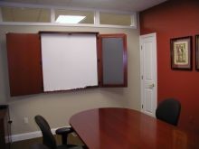 Large Dry Erase Board in conference room for coverage discussions.